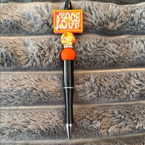 Peace Love Black and Orange Pen